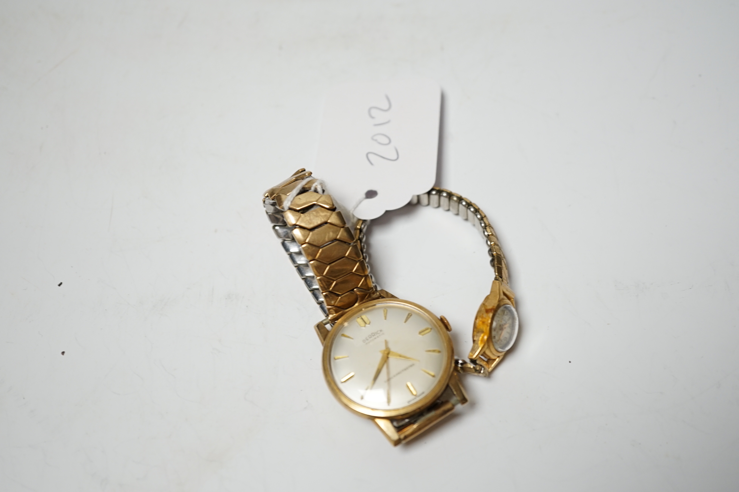 A lady's 18ct gold Plaza manual wind wrist watch, on a steel and gold plated flexible strap, together with a gentleman's 9ct gold Derrick automatic wrist watch, on a flexible strap.